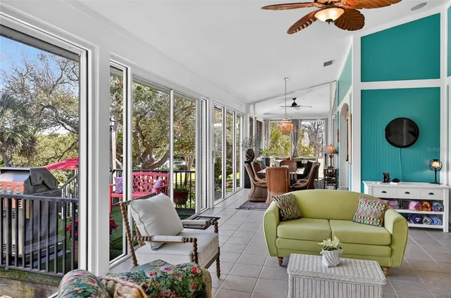 a kitchen with stainless steel appliances kitchen island granite countertop a refrigerator and a stove