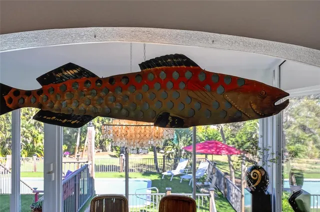 a view of a swimming pool with a yard