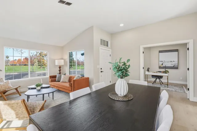 a workspace with furniture and window