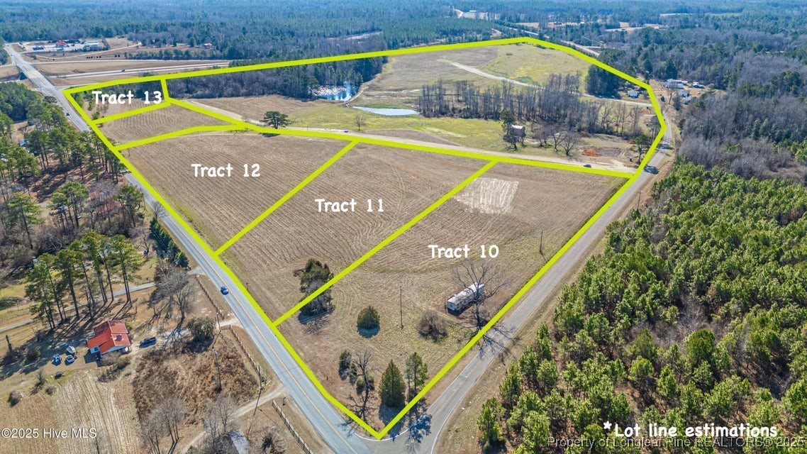 535 Sanctuary Trail Cameron, NC 28326 - Photo 2 of 9 a view of a pool with an outdoor space and seating area