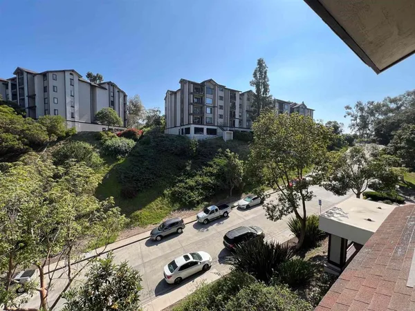 a view of a balcony with city view