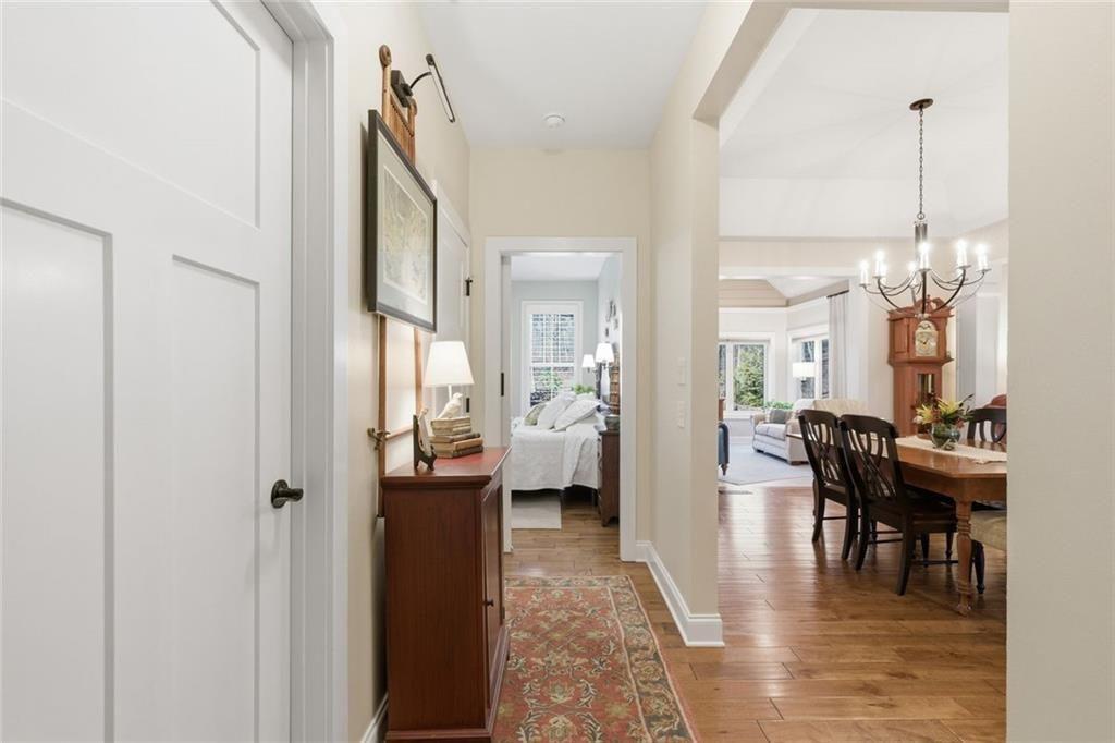 7671 Fern Lane Lula, GA 30554 - Photo 12 of 67 a view of a dining room with furniture window and wooden floor