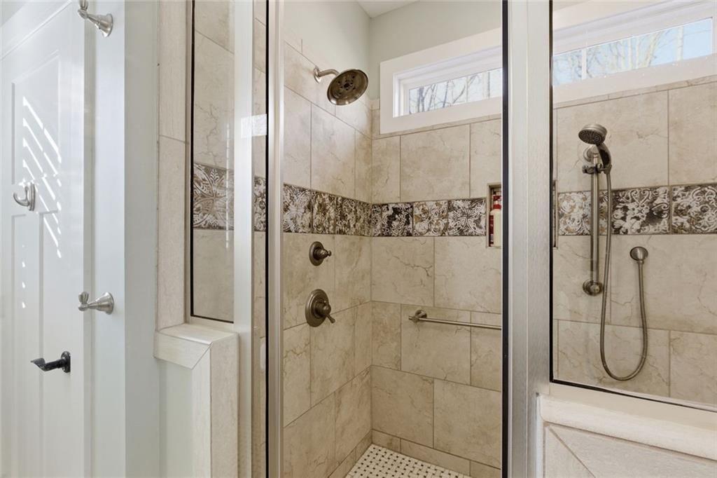 7671 Fern Lane Lula, GA 30554 - Photo 30 of 67 a bathroom with a shower