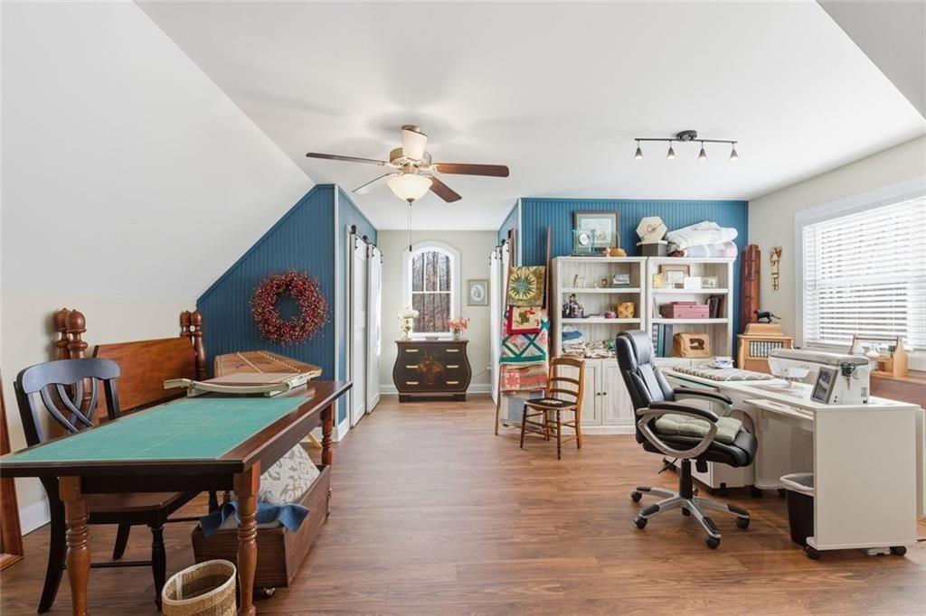 7671 Fern Lane Lula, GA 30554 - Photo 41 of 67 a view of a workspace with furniture and a workspace