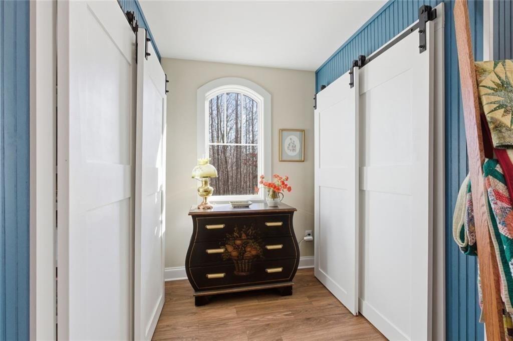 7671 Fern Lane Lula, GA 30554 - Photo 42 of 67 a view of living room with furniture and a window