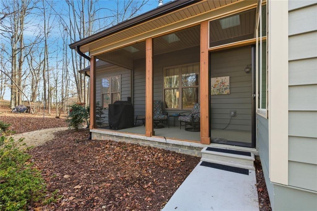 7671 Fern Lane Lula, GA 30554 - Photo 46 of 67 a view of a entrance gate of the house