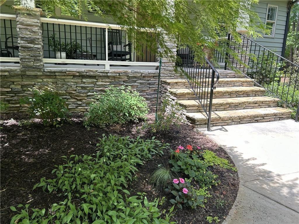 7671 Fern Lane Lula, GA 30554 - Photo 64 of 67 a view of a garden with pathway