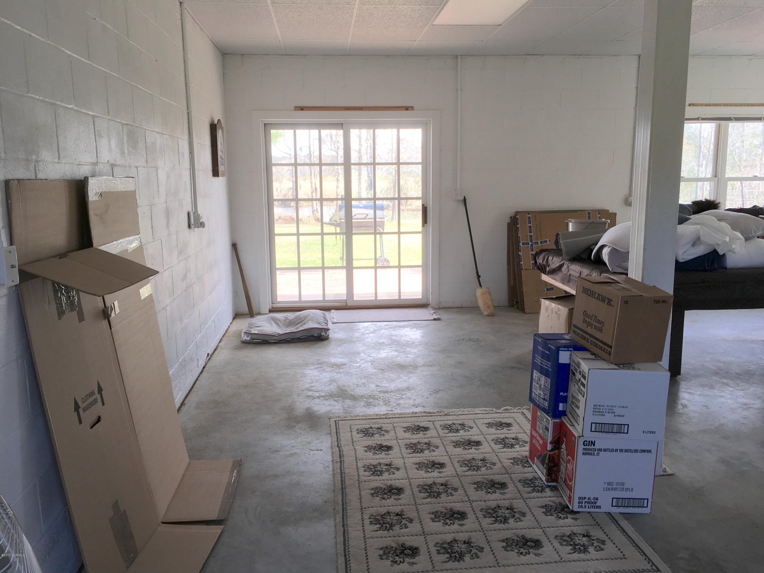 1174 Poore Farm Road Chocowinity, NC 27817 - Photo 56 of 67 Basement entrance from patio