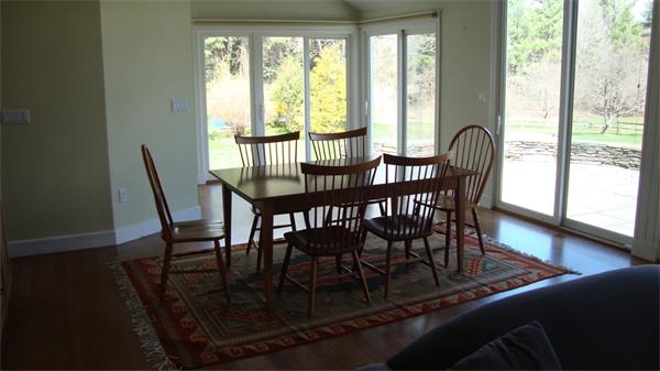 99 Concord Road Wayland, MA 01778 - Photo 12 of 12 a view of a dining room with furniture window and wooden floor