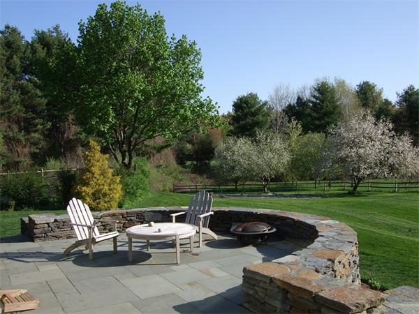 99 Concord Road Wayland, MA 01778 - Photo 3 of 12 a view of a couches in a backyard