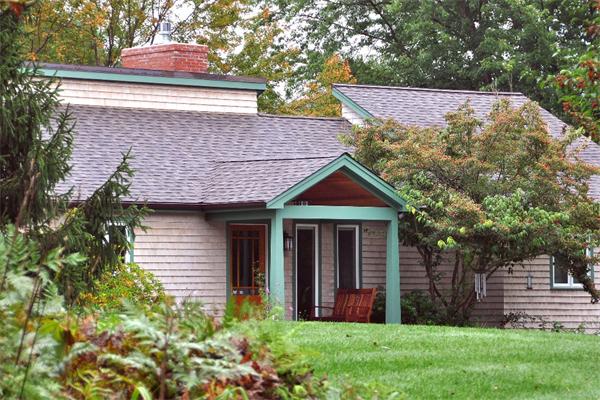 99 Concord Road Wayland, MA 01778 - Photo 4 of 12 a front view of a house with garden