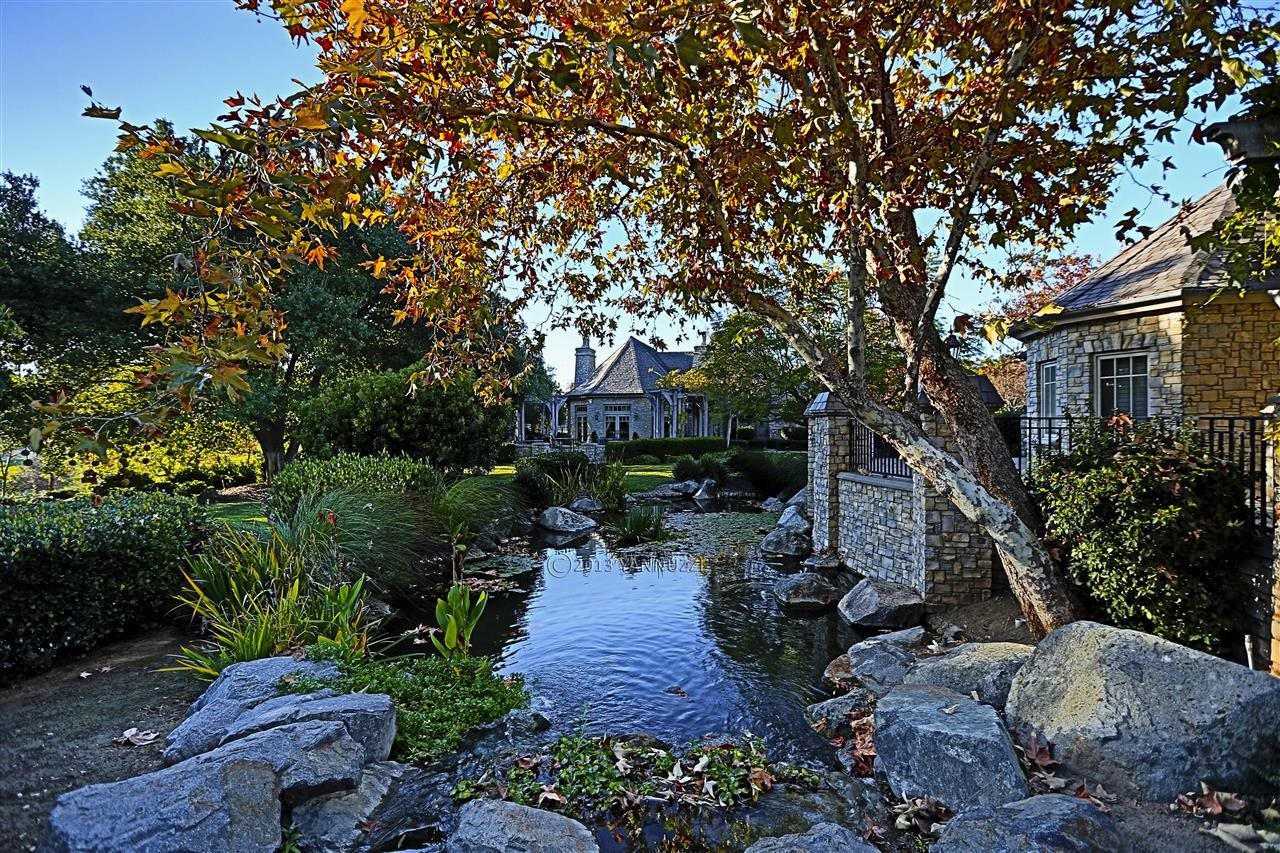 3892 Brookhills Road Fallbrook, CA 92028 - Photo 22 of 25 Common area Koi Pond with Community Clubhouse in Background