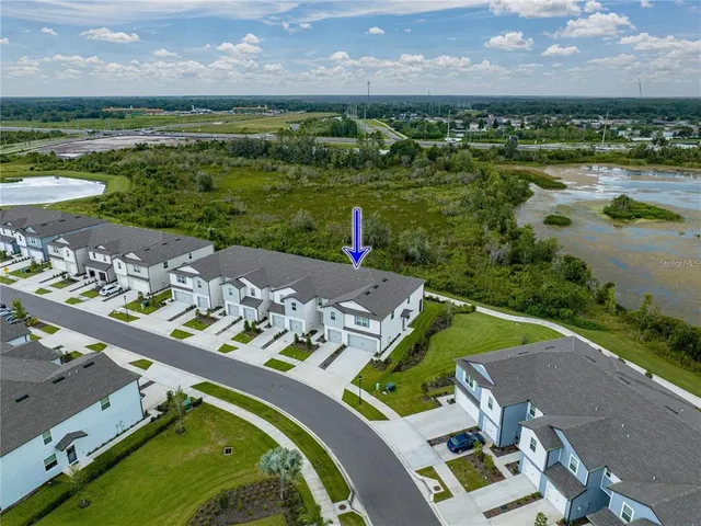 a living room with furniture and a gate