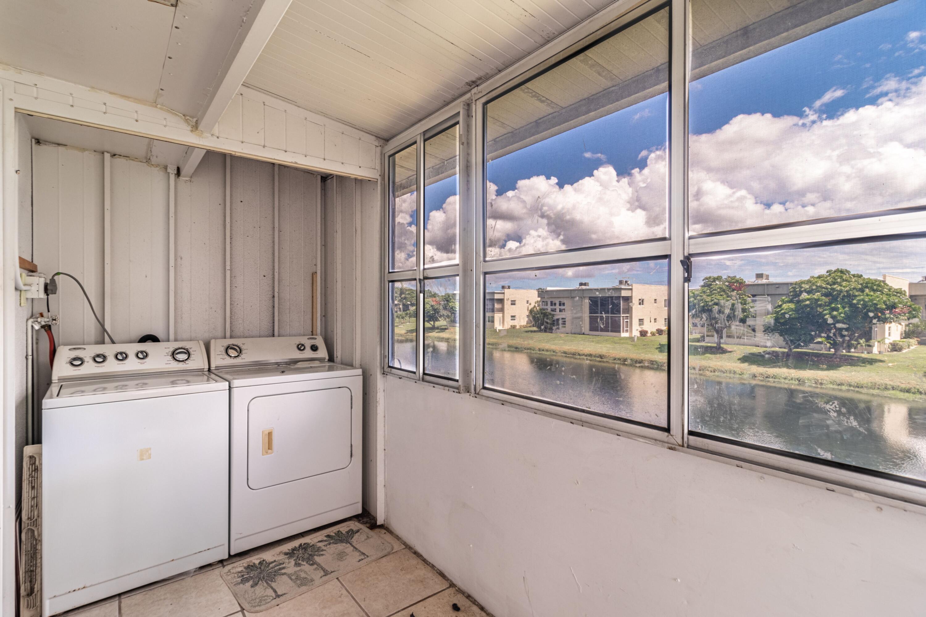 371 Monaco Way Delray Beach, FL 33446 - Photo 15 of 24 Washer dryer tiled patio