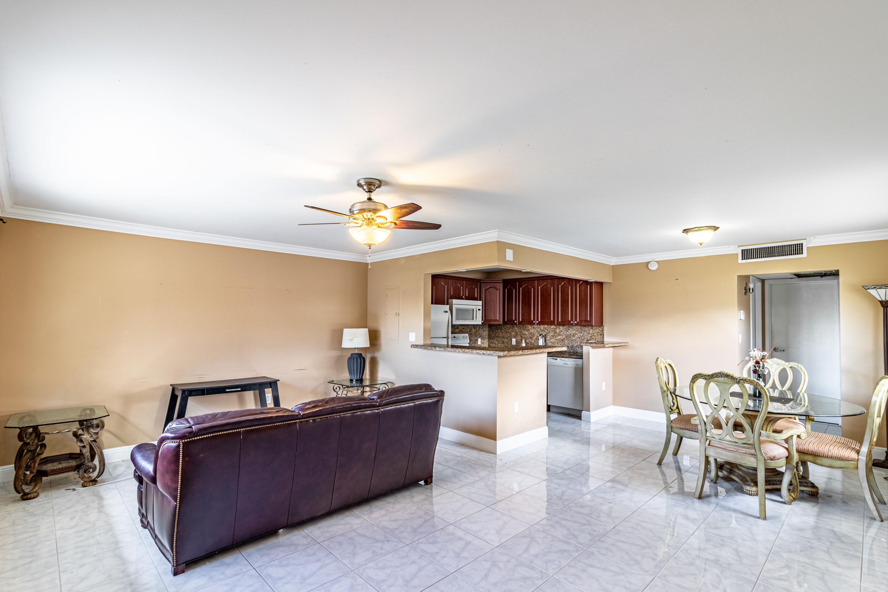 371 Monaco Way Delray Beach, FL 33446 - Photo 9 of 24 living/kitchen/dining