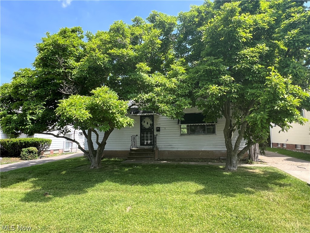 20731 Donnybrook Road Maple Heights, OH 44137 - Photo 1 of 17 Obstructed view of property with a front yard