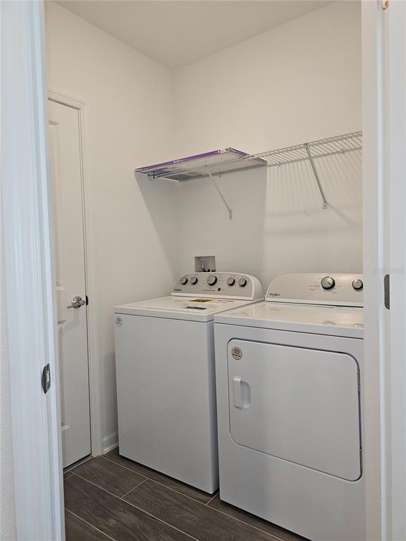 2629 Runners Circle Clermont, FL 34714 - Photo 16 of 22 a utility room with dryer and washer