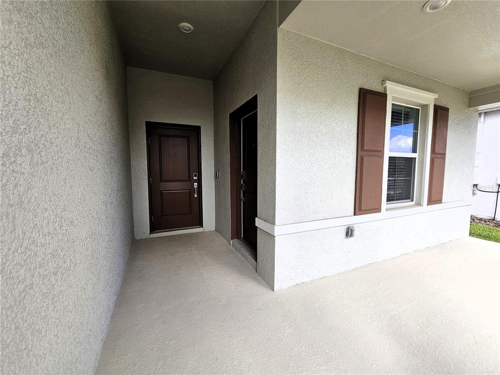 2629 Runners Circle Clermont, FL 34714 - Photo 2 of 22 a view of an empty room with closet