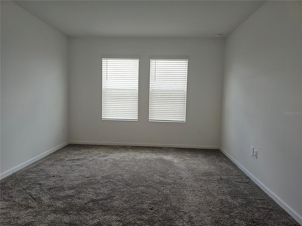 2629 Runners Circle Clermont, FL 34714 - Photo 9 of 22 an empty room with a window