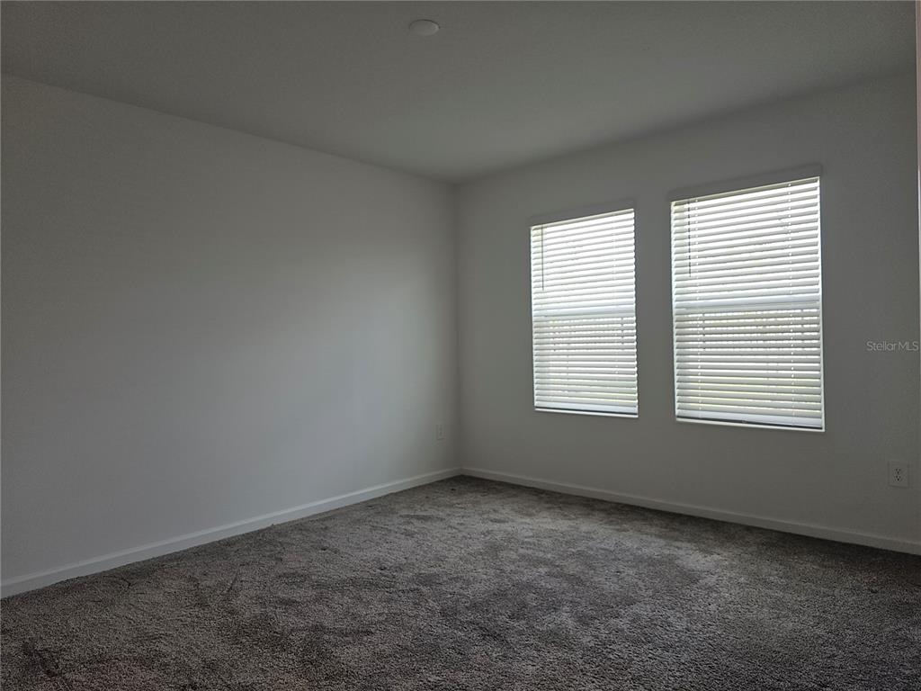2629 Runners Circle Clermont, FL 34714 - Photo 10 of 22 an empty room with a window