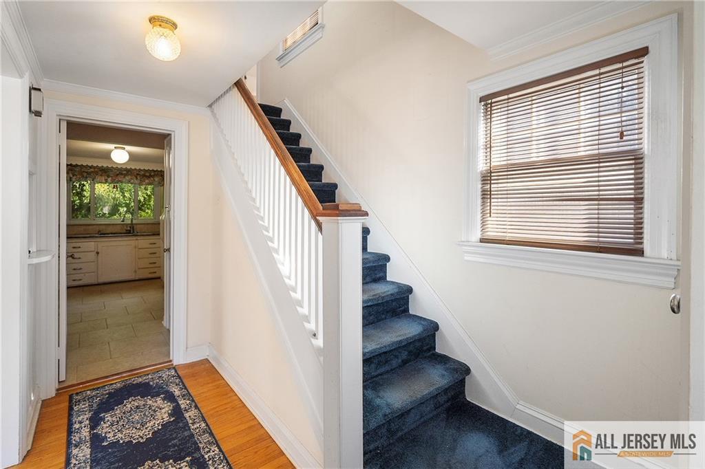 311 Ashland Road Middlesex, NJ 08846 - Photo 13 of 23 a view of entryway and hall with wooden floor