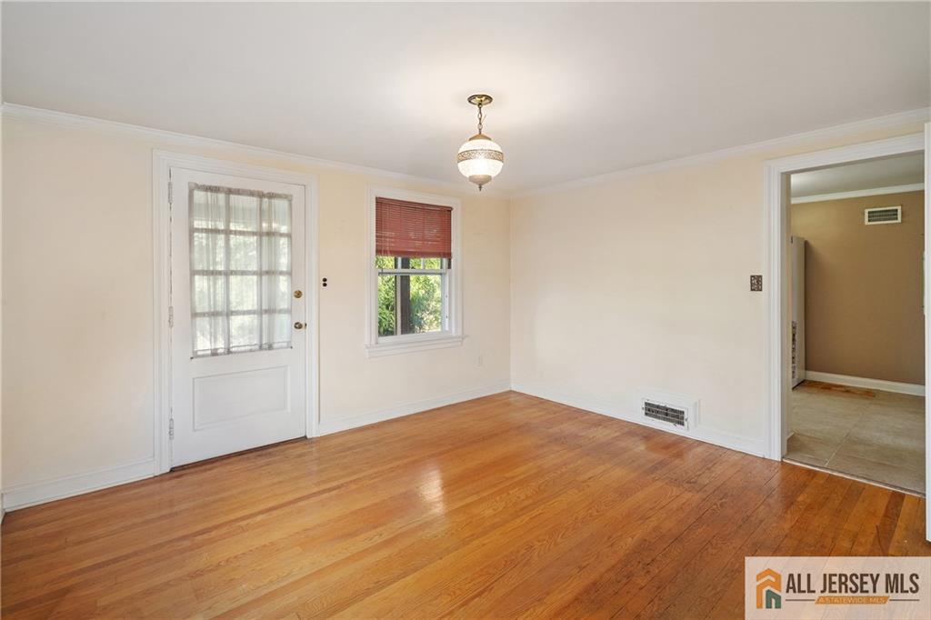 311 Ashland Road Middlesex, NJ 08846 - Photo 6 of 23 a view of an empty room with a window