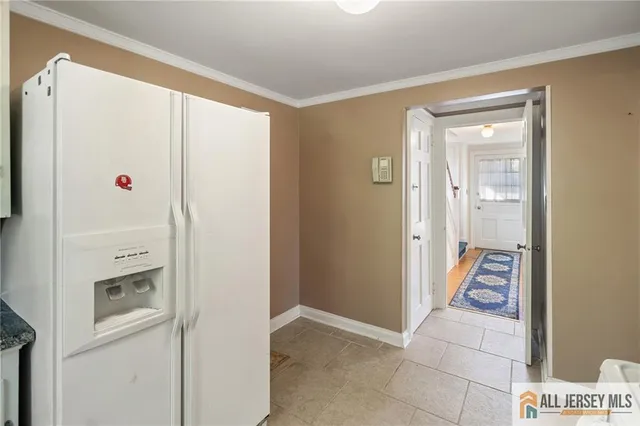 a room with a white door and a white door