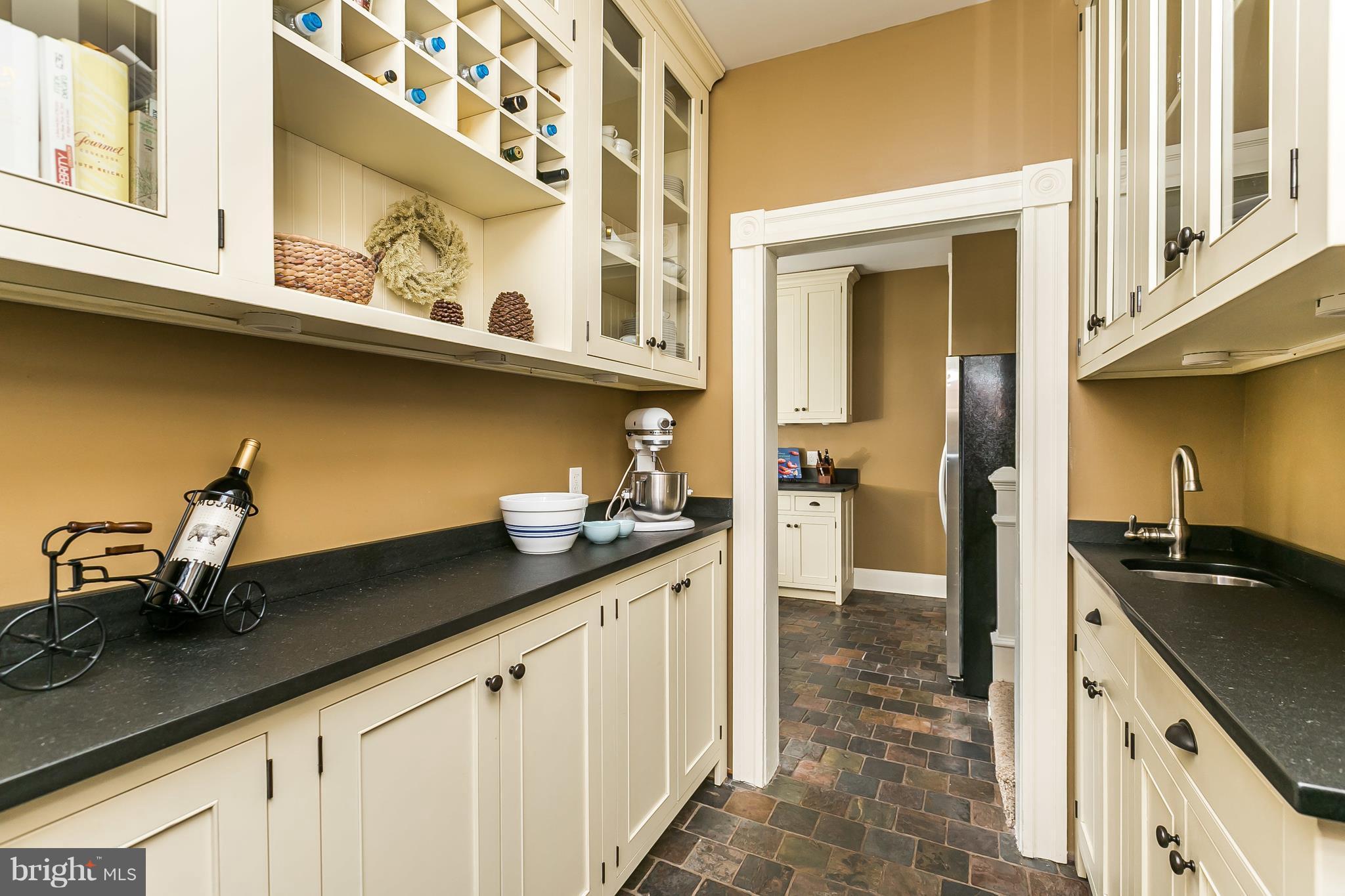 9 Dutton Avenue Baltimore, MD 21228 - Photo 13 of 30 Butler's pantry bar sink, wine rack