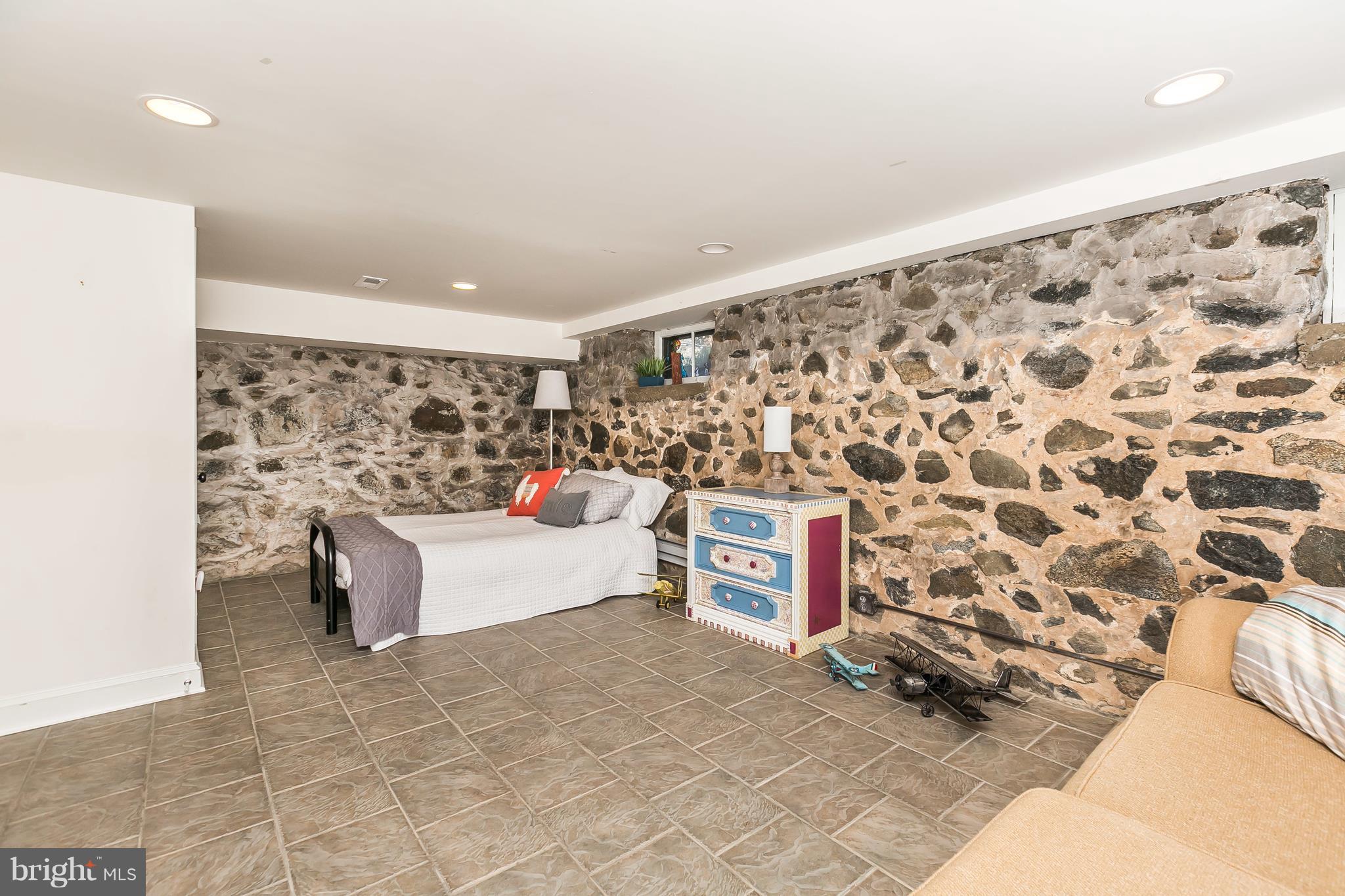 9 Dutton Avenue Baltimore, MD 21228 - Photo 21 of 30 Finished L/L w/ recessed lighting, exposed stone