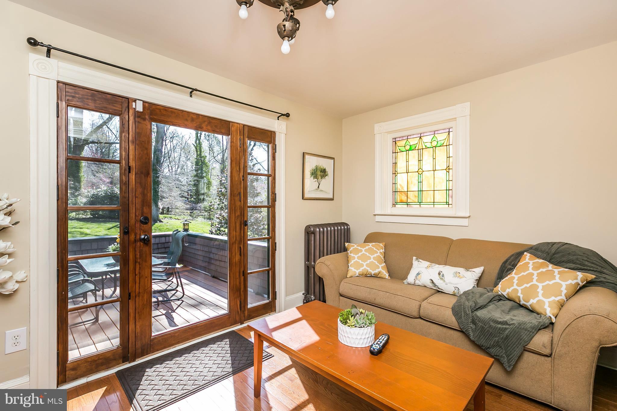 9 Dutton Avenue Baltimore, MD 21228 - Photo 7 of 30 Sun Room open to Living Room & deck