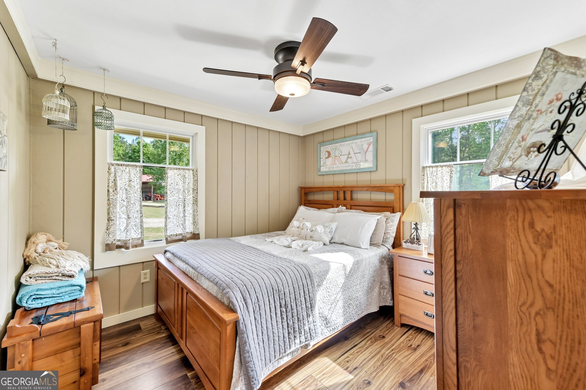2630 Cold Springs Road Greensboro, GA 30642 - Photo 20 of 28 a bedroom with a bed and wooden floor