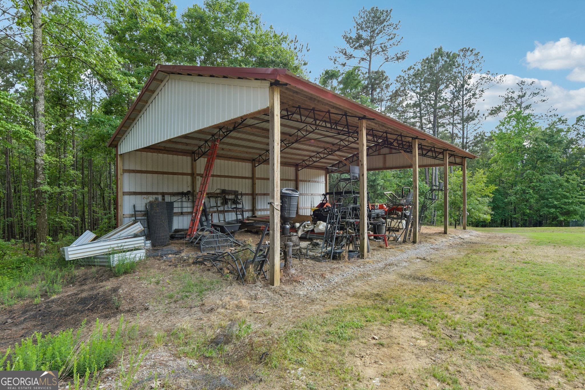 2630 Cold Springs Road Greensboro, GA 30642 - Photo 25 of 28 a view of a chair and table in backyard of the house