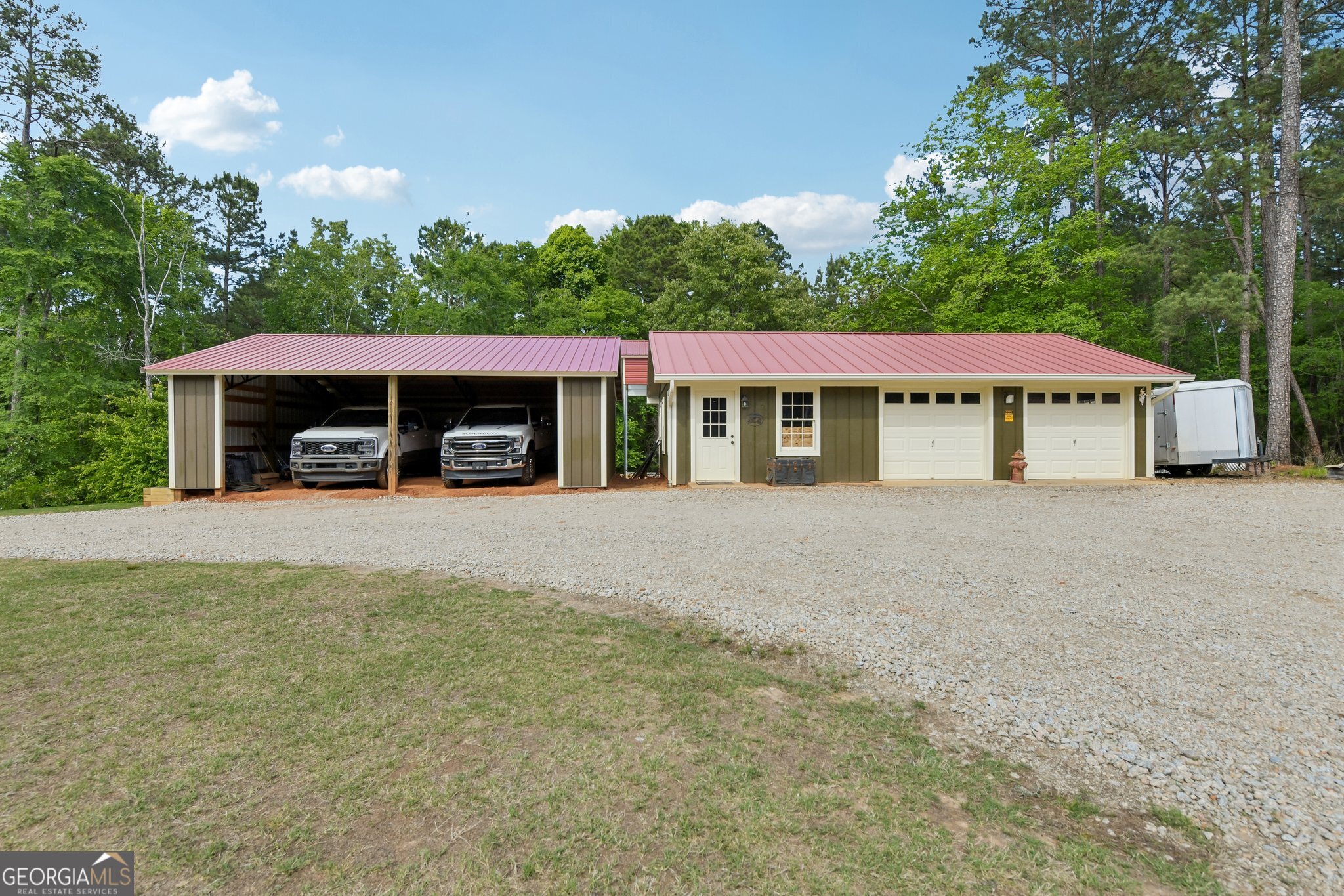 2630 Cold Springs Road Greensboro, GA 30642 - Photo 27 of 28 a house with trees in the background