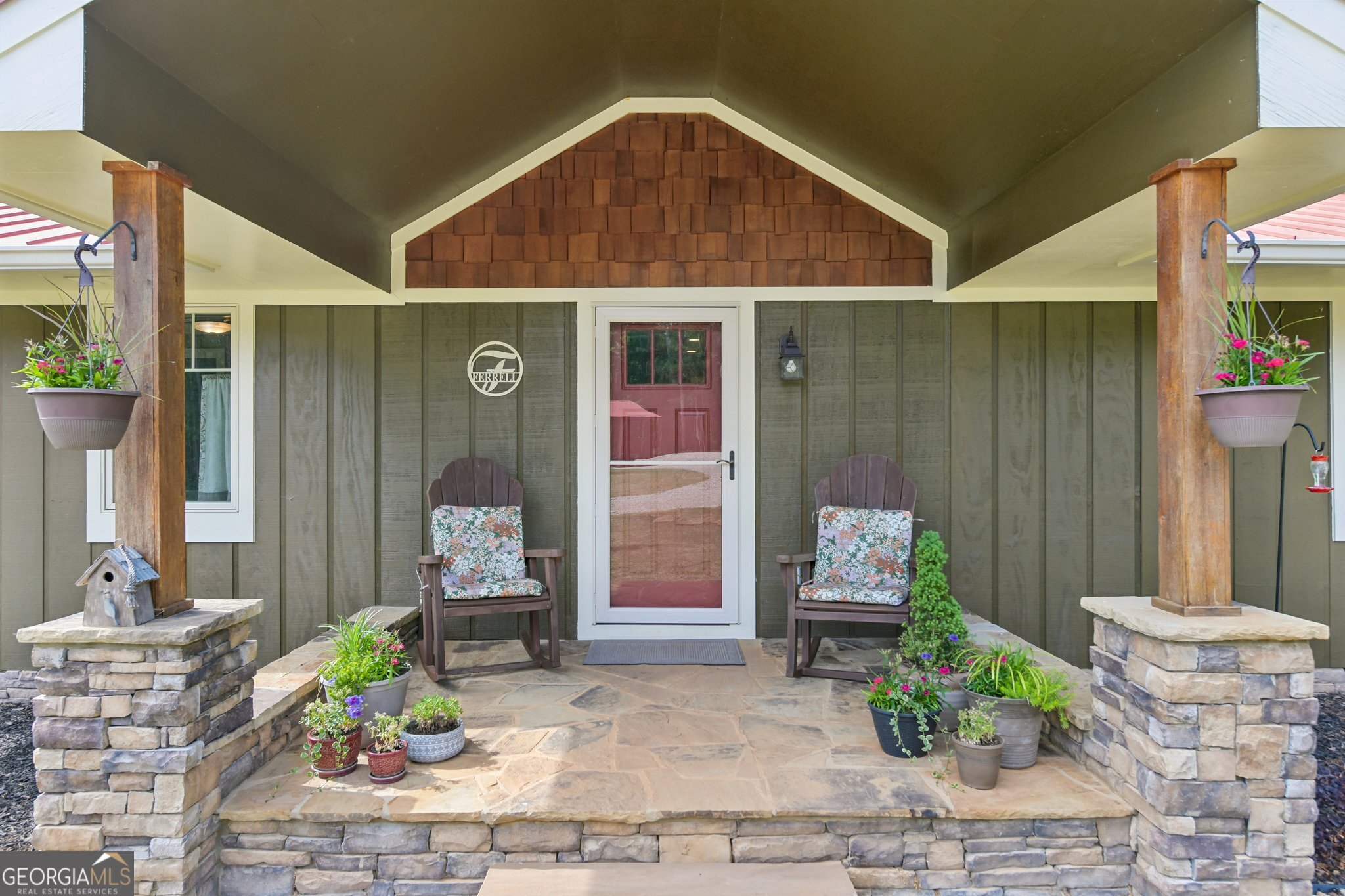 2630 Cold Springs Road Greensboro, GA 30642 - Photo 7 of 28 a front view of a house with garden