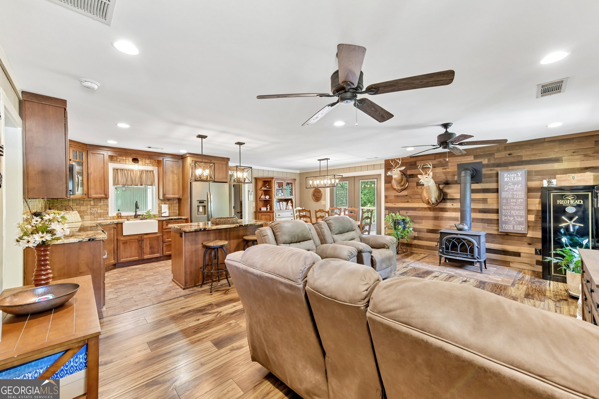 2630 Cold Springs Road Greensboro, GA 30642 - Photo 8 of 28 a living room with furniture kitchen view and a large window