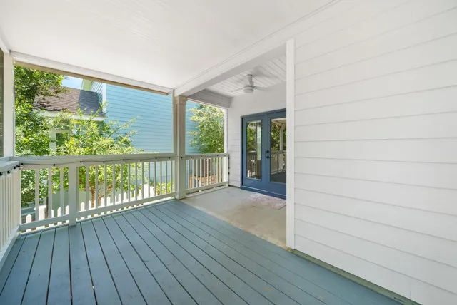 a view of a house with porch and wooden floor