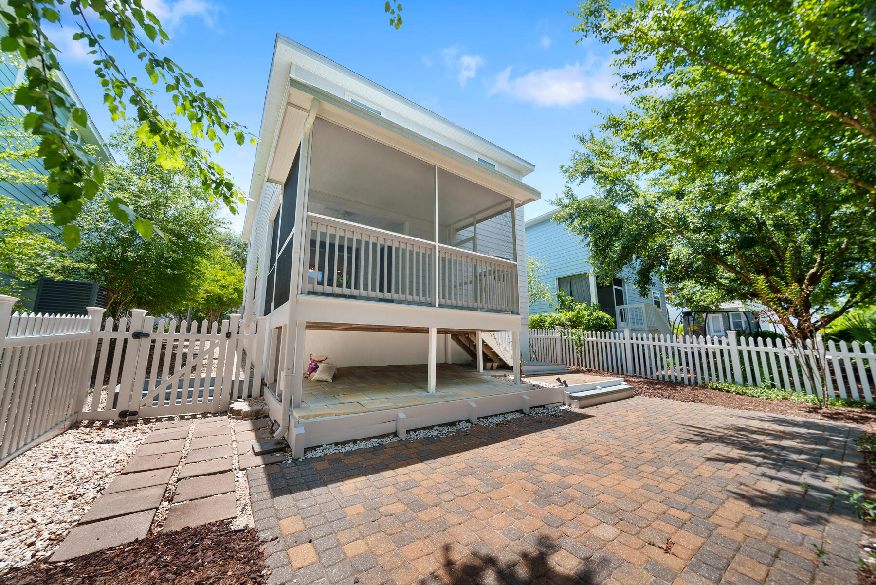41 West Shore Place Inlet Beach, FL 32461 - Photo 17 of 31 a wooden bench sitting in front of a house