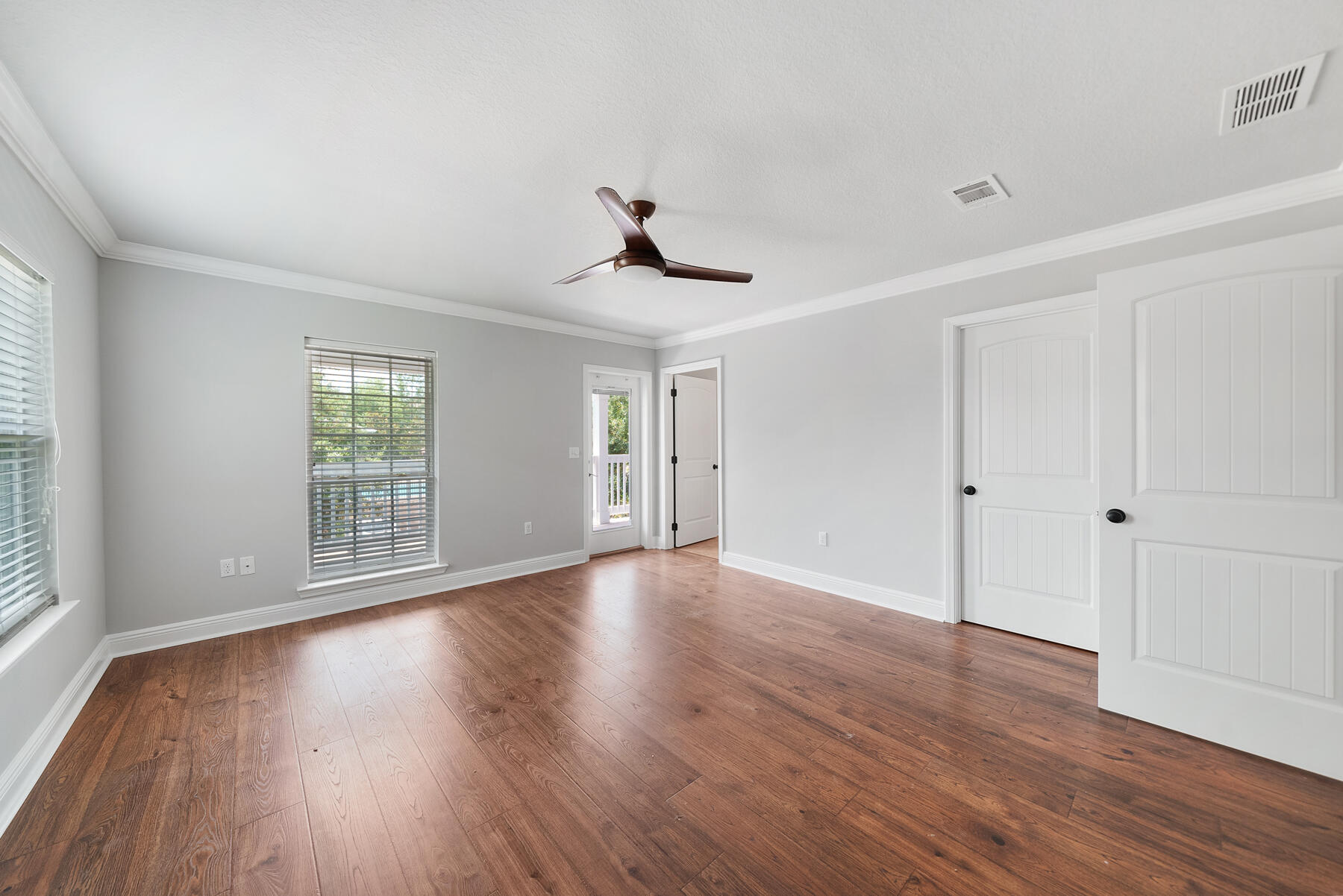 41 West Shore Place Inlet Beach, FL 32461 - Photo 20 of 31 a view of an empty room with wooden floor and a window