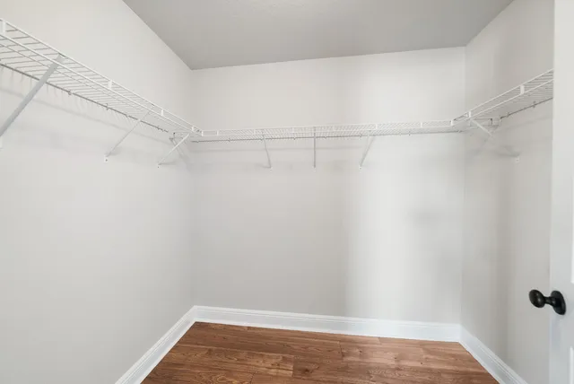 a view of a room with racks on the wall