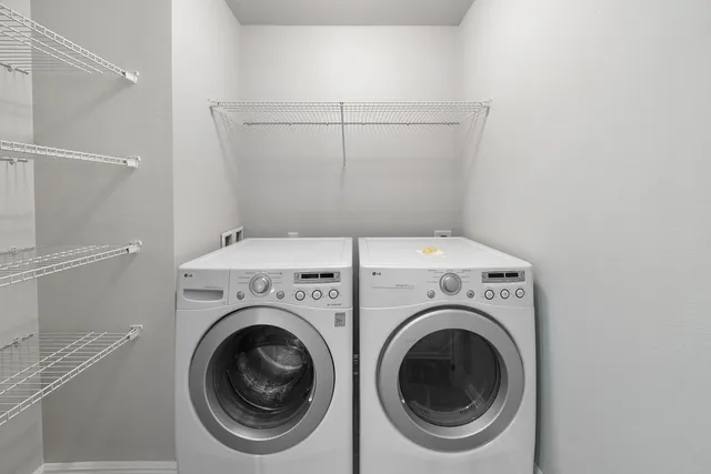 a utility room with dryer and washer