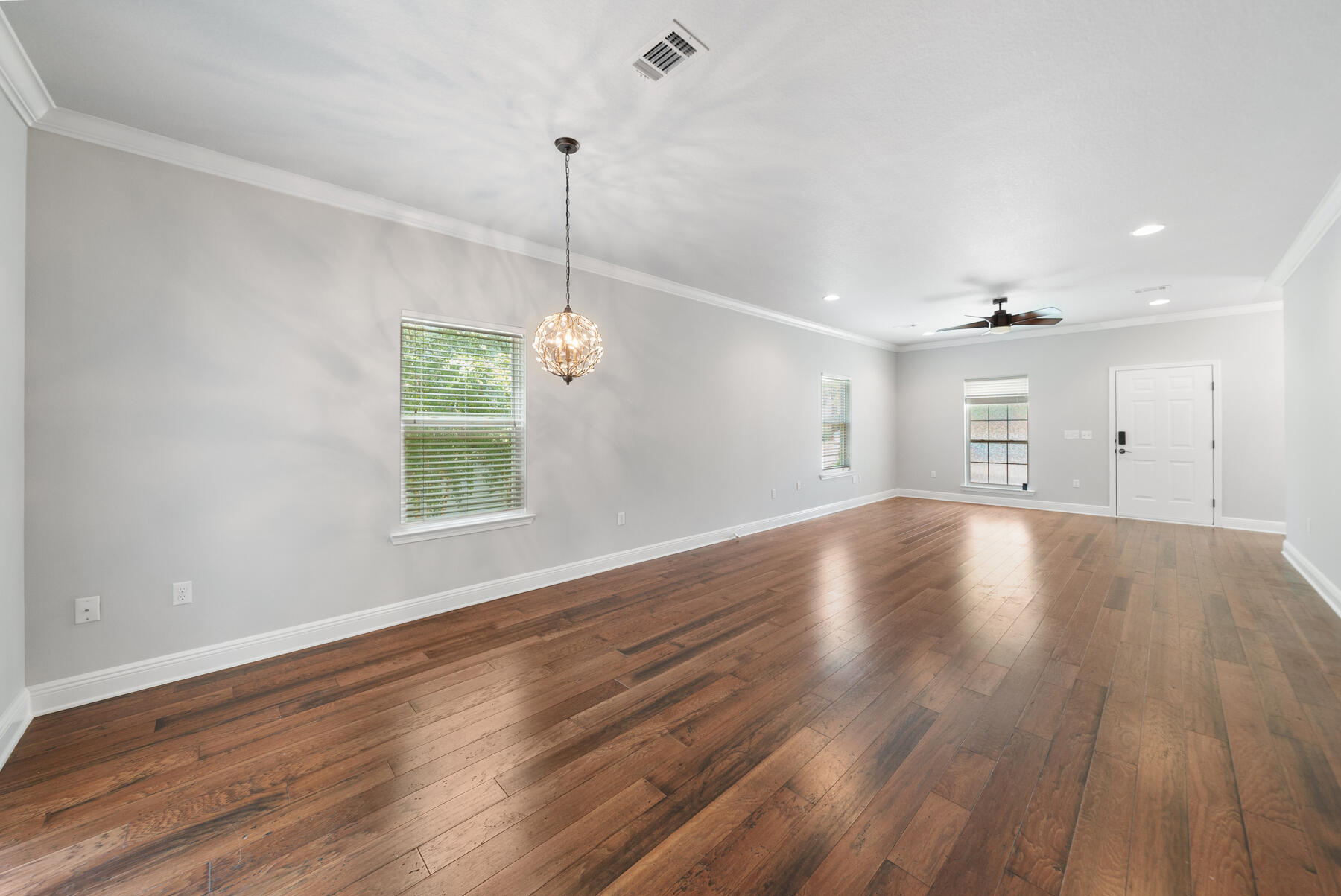 41 West Shore Place Inlet Beach, FL 32461 - Photo 8 of 31 a view of an empty room with wooden floor and a window