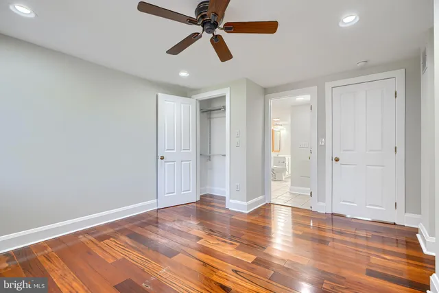 a bathroom with a toilet a sink and shower