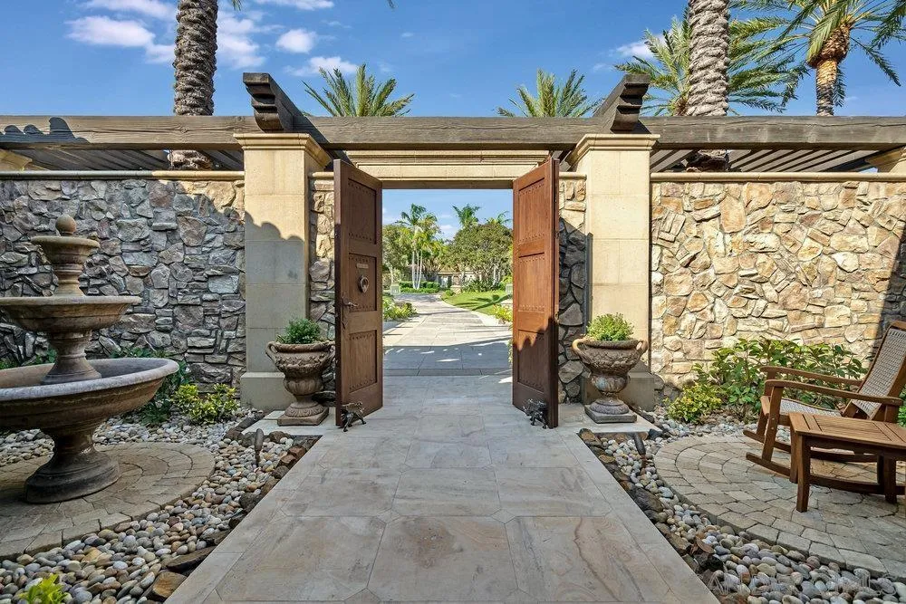 7756 St Andrews Road Rancho Santa Fe, CA 92067 - Photo 12 of 68 a view of a porch with furniture and next to a yard