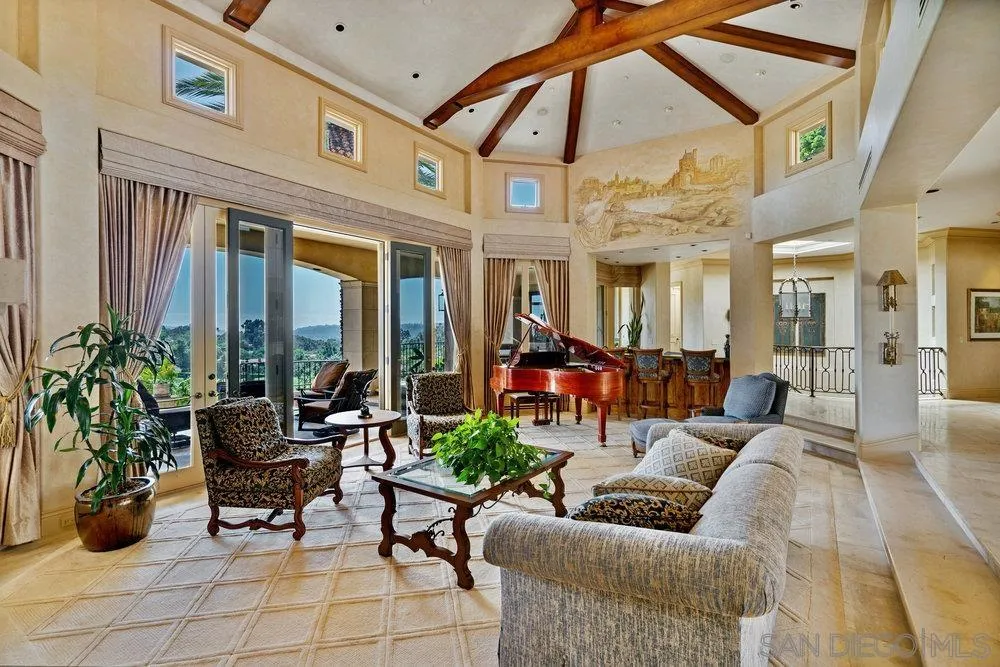 7756 St Andrews Road Rancho Santa Fe, CA 92067 - Photo 13 of 68 a living room with furniture and a potted plant