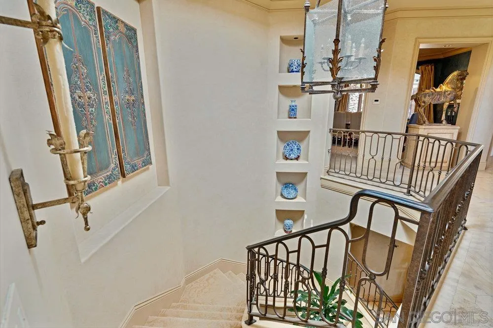 7756 St Andrews Road Rancho Santa Fe, CA 92067 - Photo 27 of 68 a view of staircase with white walls and a window