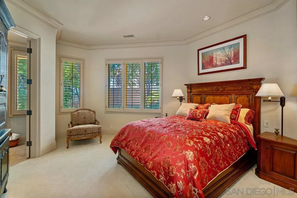 7756 St Andrews Road Rancho Santa Fe, CA 92067 - Photo 38 of 68 a bed sitting in a bedroom next to a window