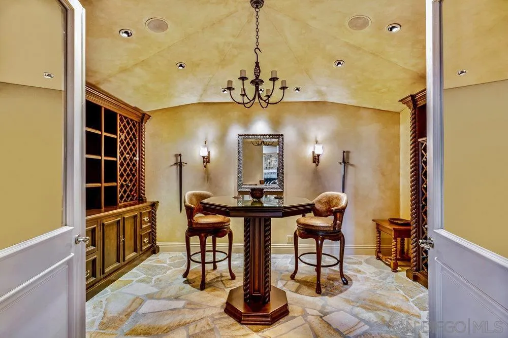 7756 St Andrews Road Rancho Santa Fe, CA 92067 - Photo 40 of 68 a view of a room with furniture and wooden floor