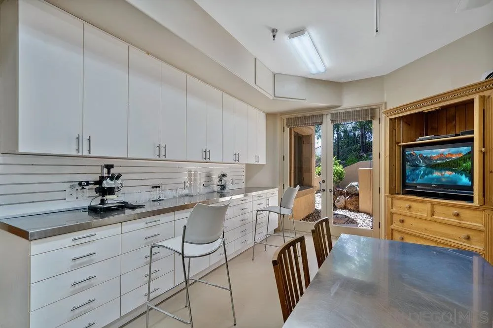 7756 St Andrews Road Rancho Santa Fe, CA 92067 - Photo 42 of 68 a kitchen with granite countertop lots of counter top space