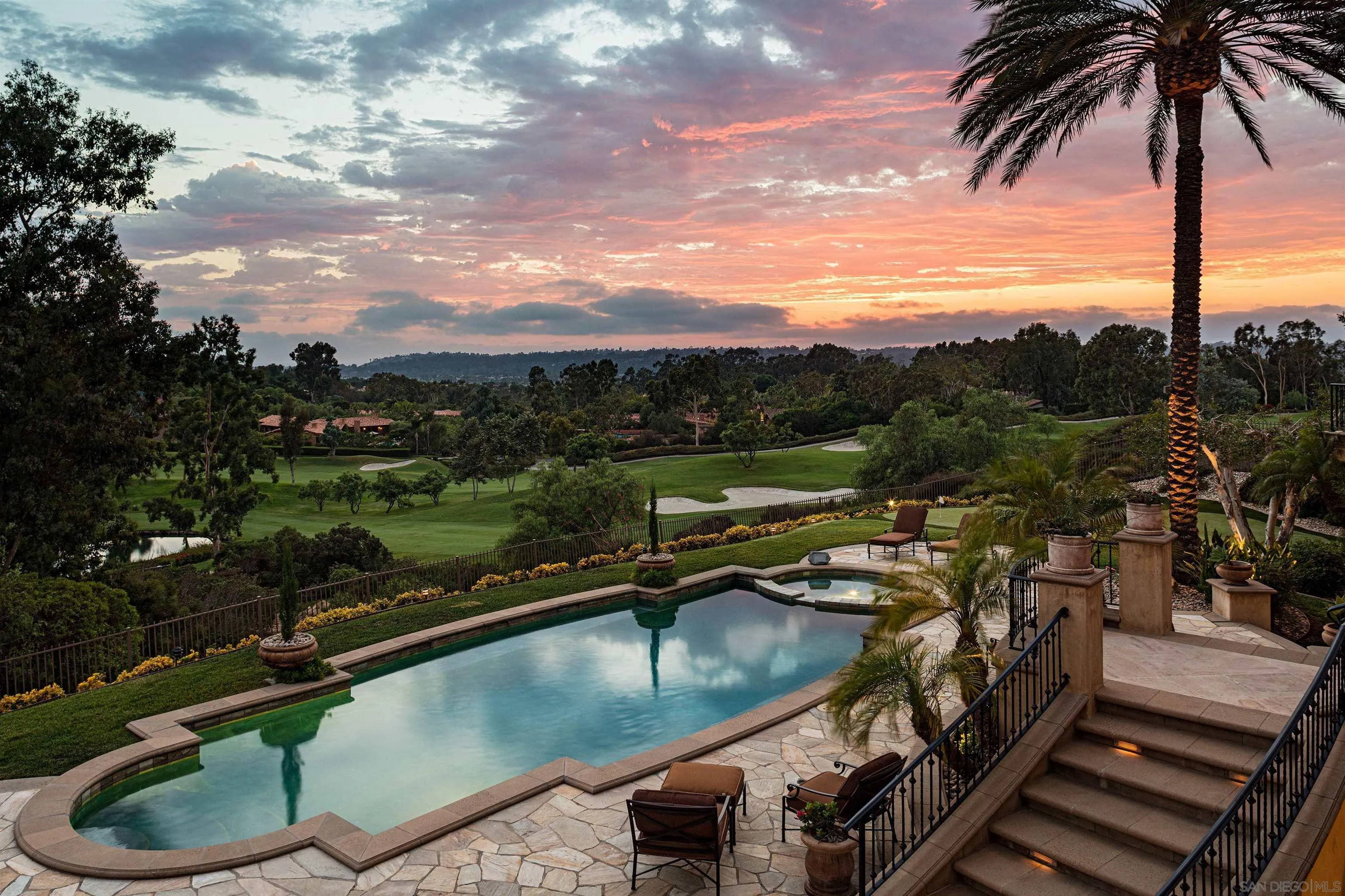 7756 St Andrews Road Rancho Santa Fe, CA 92067 - Photo 53 of 68 a view of a swimming pool with a patio