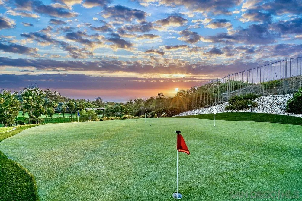 7756 St Andrews Road Rancho Santa Fe, CA 92067 - Photo 60 of 68 a view of a green field with wooden fence